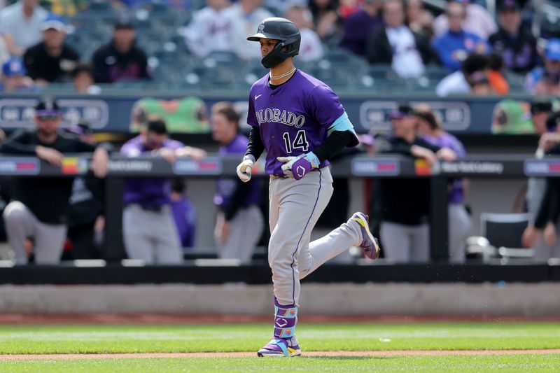May 31, 2025; New York City, New York, USA; Colorado Rockies shortstop Ezequiel Tovar (14) rounds the bases after hitting a solo home run against the New York Mets during the first inning at Citi Field. Mandatory Credit: Brad Penner-Imagn Images