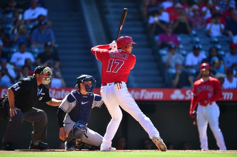 Jul 19, 2023; Anaheim, California, USA; Los Angeles Angels designated hitter Shohei Ohtani (17) hits against the New York Yankees during the first inning at Angel Stadium. Mandatory Credit: Gary A. Vasquez-USA TODAY Sports