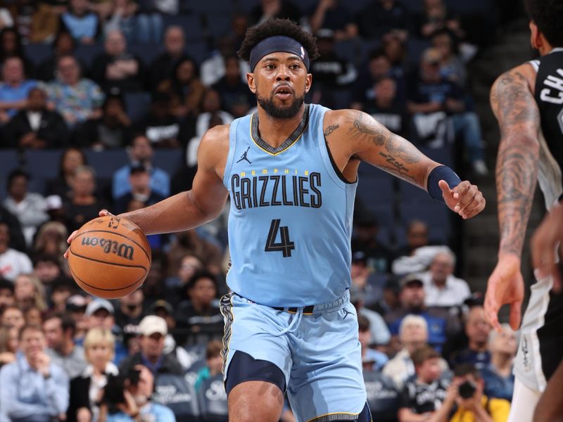 MEMPHIS, TN - APRIL 9: Jordan Goodwin #4 of the Memphis Grizzlies dribbles the ball during the game against the San Antonio Spurs on April 9, 2024 at FedExForum in Memphis, Tennessee. NOTE TO USER: User expressly acknowledges and agrees that, by downloading and or using this photograph, User is consenting to the terms and conditions of the Getty Images License Agreement. Mandatory Copyright Notice: Copyright 2024 NBAE (Photo by Joe Murphy/NBAE via Getty Images)