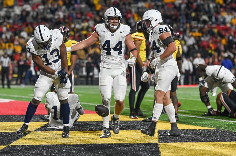 Nov 4, 2023; College Park, Maryland, USA; Penn State Nittany Lions running back Kaytron Allen (13) spikes the ball after scoring a second half touchdown against the Maryland Terrapins  at SECU Stadium. Mandatory Credit: Tommy Gilligan-USA TODAY Sports