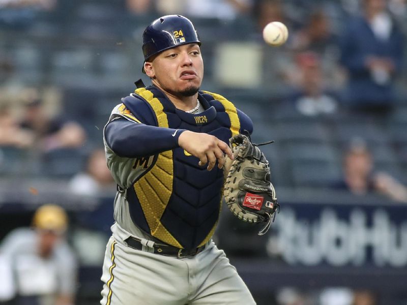 Sep 9, 2023; Bronx, New York, USA;  Milwaukee Brewers catcher William Contreras (24) throws a runner out at first base in the seventh inning against the New York Yankees at Yankee Stadium. Mandatory Credit: Wendell Cruz-USA TODAY Sports