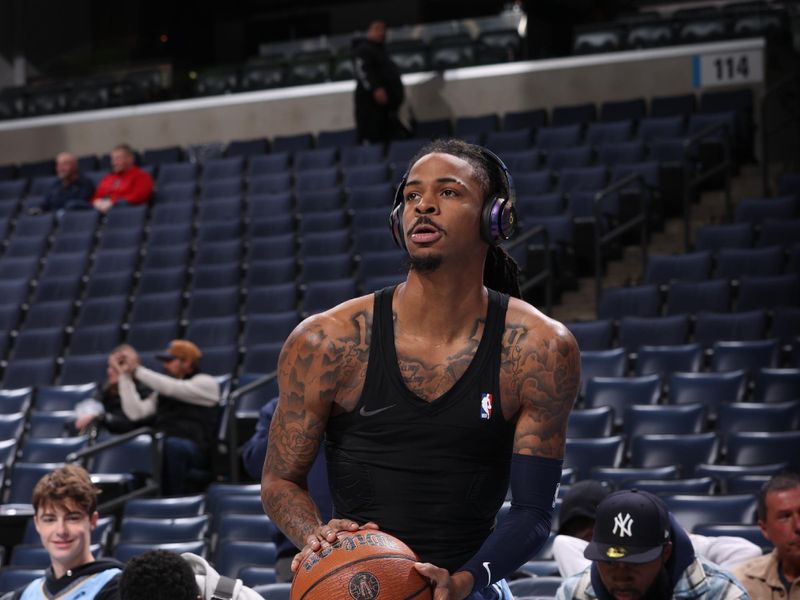 MEMPHIS, TN - NOVEMBER 29: Ja Morant #12 of the Memphis Grizzlies warms up before the game against the New Orleans Pelicans during the Emirates NBA Cup game on November 29, 2024 at FedExForum in Memphis, Tennessee. NOTE TO USER: User expressly acknowledges and agrees that, by downloading and or using this photograph, User is consenting to the terms and conditions of the Getty Images License Agreement. Mandatory Copyright Notice: Copyright 2024 NBAE (Photo by Joe Murphy/NBAE via Getty Images)
