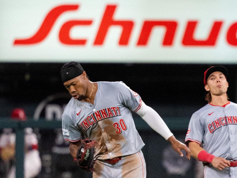 Jun 27, 2024; St. Louis, Missouri, USA; Cincinnati Reds outfielder Will Benson (30) catches a ball against the St. Louis Cardinals in the eighth inning at Busch Stadium. Mandatory Credit: Zach Dalin-USA TODAY Sports