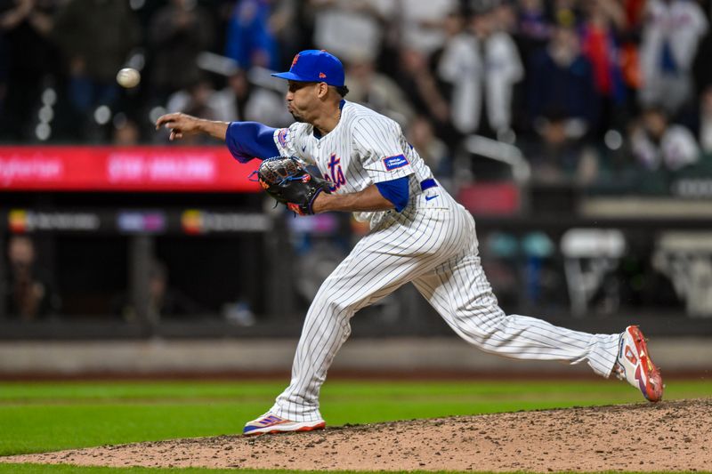 Apr 15, 2024; New York City, New York, USA; New York Mets pitcher Edwin Díaz pitches during the ninth inning against the Pittsburgh Pirates at Citi Field. Mandatory Credit: John Jones-USA TODAY Sports