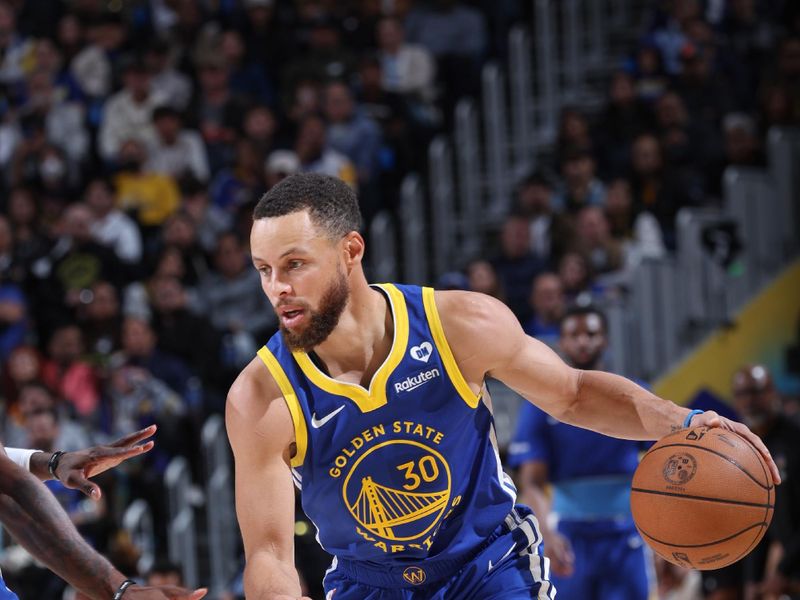 SAN FRANCISCO, CA - APRIL 2:  Stephen Curry #30 of the Golden State Warriors handles the ball during the game  on April 2, 2024 at Chase Center in San Francisco, California. NOTE TO USER: User expressly acknowledges and agrees that, by downloading and or using this photograph, user is consenting to the terms and conditions of Getty Images License Agreement. Mandatory Copyright Notice: Copyright 2024 NBAE (Photo by Jeff Haynes/NBAE via Getty Images)