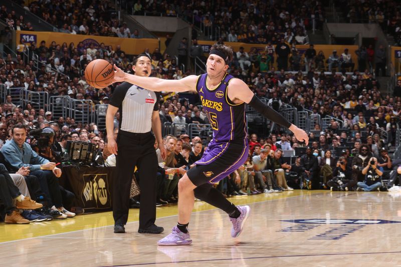 LOS ANGELES, CA - FEBRUARY 25: Austin Reaves #15 of the Los Angeles Lakers handles the ball during the game against the Dallas Mavericks on February 25, 2025 at Crypto.Com Arena in Los Angeles, California. NOTE TO USER: User expressly acknowledges and agrees that, by downloading and/or using this Photograph, user is consenting to the terms and conditions of the Getty Images License Agreement. Mandatory Copyright Notice: Copyright 2025 NBAE (Photo by Nathaniel S. Butler/NBAE via Getty Images)