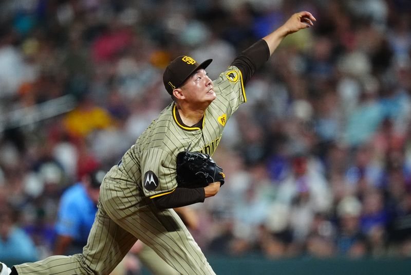 Aug 16, 2024; Denver, Colorado, USA; San Diego Padres relief pitcher Yuki Matsui (1) delivers a pitch in the sixth inning against the Colorado Rockies at Coors Field. Mandatory Credit: Ron Chenoy-USA TODAY Sports