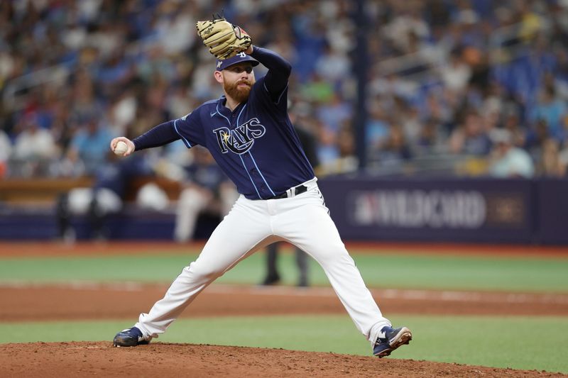 Oct 4, 2023; St. Petersburg, Florida, USA; Tampa Bay Rays relief pitcher Zack Littell (52) pitches against the Texas Rangers in the eighth inning during game two of the Wildcard series for the 2023 MLB playoffs at Tropicana Field. Mandatory Credit: Nathan Ray Seebeck-USA TODAY Sports