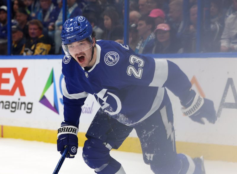 Dec 6, 2023; Tampa, Florida, USA; Tampa Bay Lightning center Michael Eyssimont (23) reacts against the Pittsburgh Penguins during the third period at Amalie Arena. Mandatory Credit: Kim Klement Neitzel-USA TODAY Sports