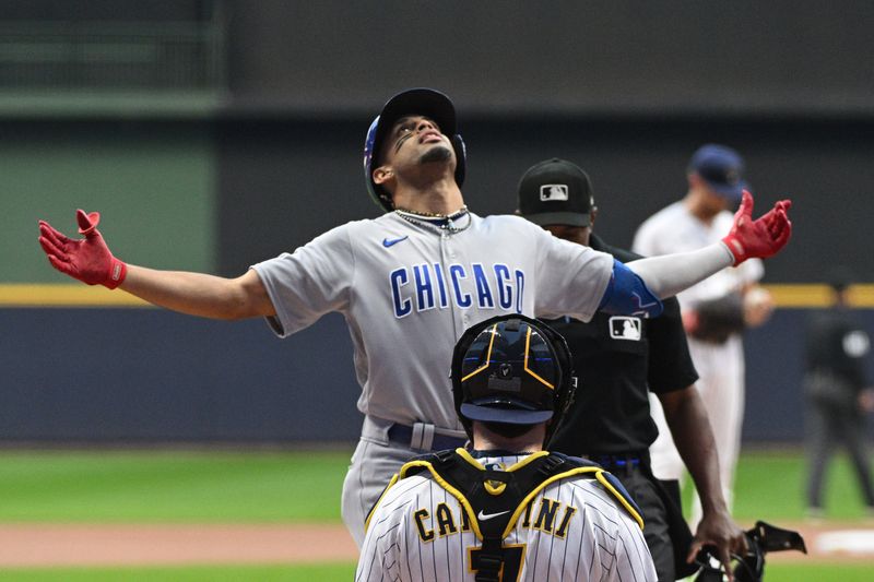 Sep 30, 2023; Milwaukee, Wisconsin, USA; Chicago Cubs second baseman Christopher Morel (5) celebrates after hitting a home run in the first inning against the Milwaukee Brewers at American Family Field. Mandatory Credit: Michael McLoone-USA TODAY Sports