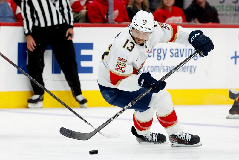 Oct 15, 2025; Detroit, Michigan, USA;  Florida Panthers center Sam Reinhart (13) skates with the puck in the first period against the Detroit Red Wings at Little Caesars Arena. Mandatory Credit: Rick Osentoski-Imagn Images