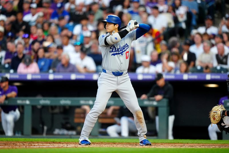 Jun 19, 2024; Denver, Colorado, USA; Los Angeles Dodgers designated hitter Shohei Ohtani (17) at the plate in the sixth inning against the Colorado Rockies at Coors Field. Mandatory Credit: Ron Chenoy-USA TODAY Sports