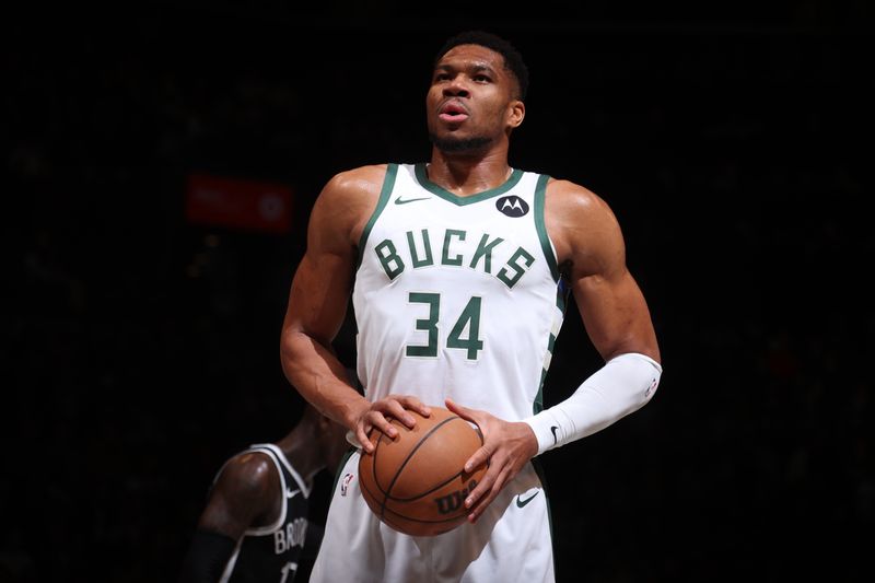 BROOKLYN, NY - DECEMBER 8: Giannis Antetokounmpo #34 of the Milwaukee Bucks shoots a free throw during the game against the Brooklyn Nets on December 8, 2024 at Barclays Center in Brooklyn, New York. NOTE TO USER: User expressly acknowledges and agrees that, by downloading and or using this Photograph, user is consenting to the terms and conditions of the Getty Images License Agreement. Mandatory Copyright Notice: Copyright 2024 NBAE (Photo by Nathaniel S. Butler/NBAE via Getty Images)