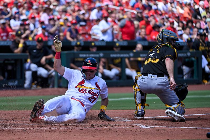 Sep 3, 2023; St. Louis, Missouri, USA;  St. Louis Cardinals center fielder Lars Nootbaar (21) slides safely past Pittsburgh Pirates catcher Jason Delay (55) and scores during the second inning at Busch Stadium. Mandatory Credit: Jeff Curry-USA TODAY Sports