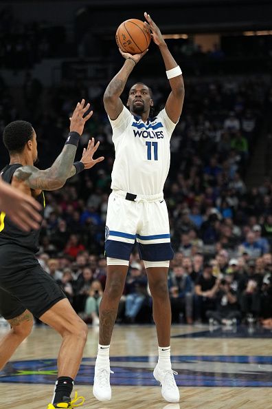 MINNEAPOLIS, MN -  NOVEMBER 30 :  Naz Reid #11 of the Minnesota Timberwolves shoots the ball during the game against the Utah Jazz on November 30, 2023 at Target Center in Minneapolis, Minnesota. NOTE TO USER: User expressly acknowledges and agrees that, by downloading and or using this Photograph, user is consenting to the terms and conditions of the Getty Images License Agreement. Mandatory Copyright Notice: Copyright 2023 NBAE (Photo by Jordan Johnson/NBAE via Getty Images)