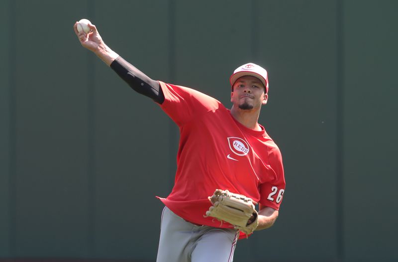 Aug 10, 2025; Pittsburgh, Pennsylvania, USA;  Cincinnati Reds pitcher Chase Burns (26) throws in the outfield before the game against the Pittsburgh Pirates at PNC Park. Mandatory Credit: Charles LeClaire-Imagn Images
