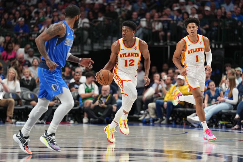 DALLAS, TX - APRIL 4: De'Andre Hunter #12 of the Atlanta Hawks handles the ball during the game on April 4, 2024 at the American Airlines Center in Dallas, Texas. NOTE TO USER: User expressly acknowledges and agrees that, by downloading and or using this photograph, User is consenting to the terms and conditions of the Getty Images License Agreement. Mandatory Copyright Notice: Copyright 2024 NBAE (Photo by Glenn James/NBAE via Getty Images)