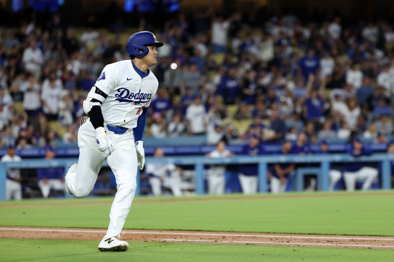 Sep 11, 2024; Los Angeles, California, USA;  Los Angeles Dodgers designated hitter Shohei Ohtani (17) runs around bases on a home run during the first inning against the Chicago Cubs at Dodger Stadium. Mandatory Credit: Kiyoshi Mio-Imagn Images