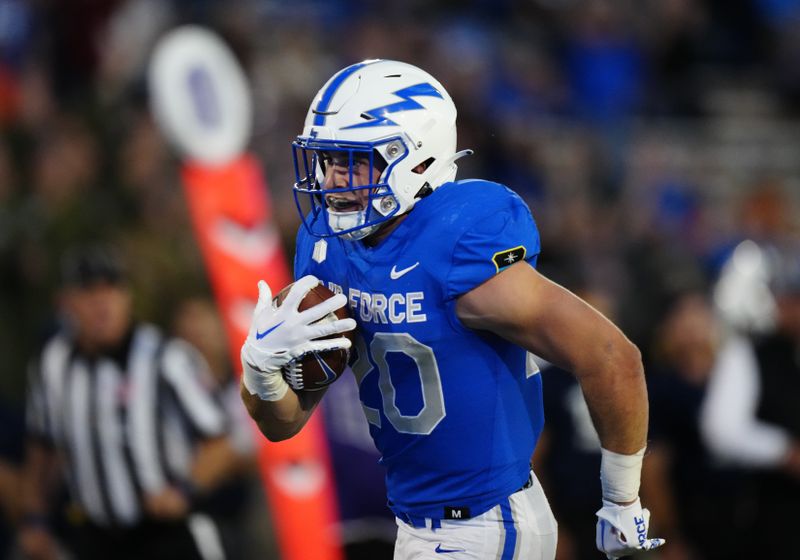 Sep 23, 2022; Colorado Springs, Colorado, USA; Air Force Falcons running back Brad Roberts (20) carries the ball in the second quarter against the Nevada Wolf Pack at Falcon Stadium. Mandatory Credit: Ron Chenoy-USA TODAY Sports