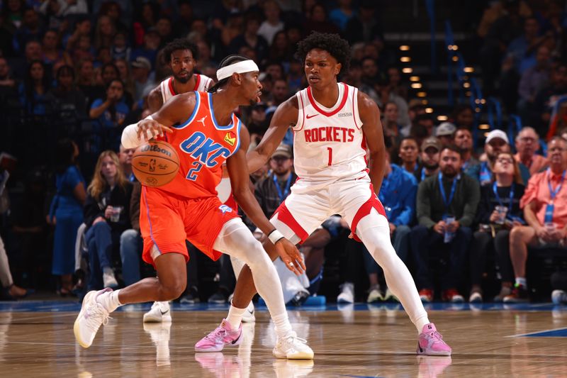 OKLAHOMA CITY, OK - NOVEMBER 8: Amen Thompson #1 of the Houston Rockets defends against the Oklahoma City Thunder on November 8, 2024 at Paycom Center in Oklahoma City, Oklahoma. NOTE TO USER: User expressly acknowledges and agrees that, by downloading and or using this photograph, User is consenting to the terms and conditions of the Getty Images License Agreement. Mandatory Copyright Notice: Copyright 2024 NBAE (Photo by Zach Beeker/NBAE via Getty Images)