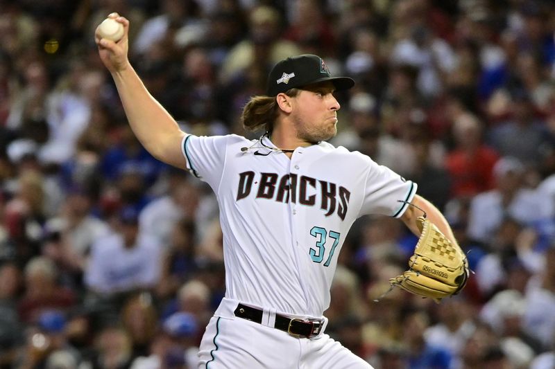 Oct 11, 2023; Phoenix, Arizona, USA; Arizona Diamondbacks relief pitcher Kevin Ginkel (37) throws a pitch against the Los Angeles Dodgers in the eighth inning for game three of the NLDS for the 2023 MLB playoffs at Chase Field. Mandatory Credit: Matt Kartozian-USA TODAY Sports