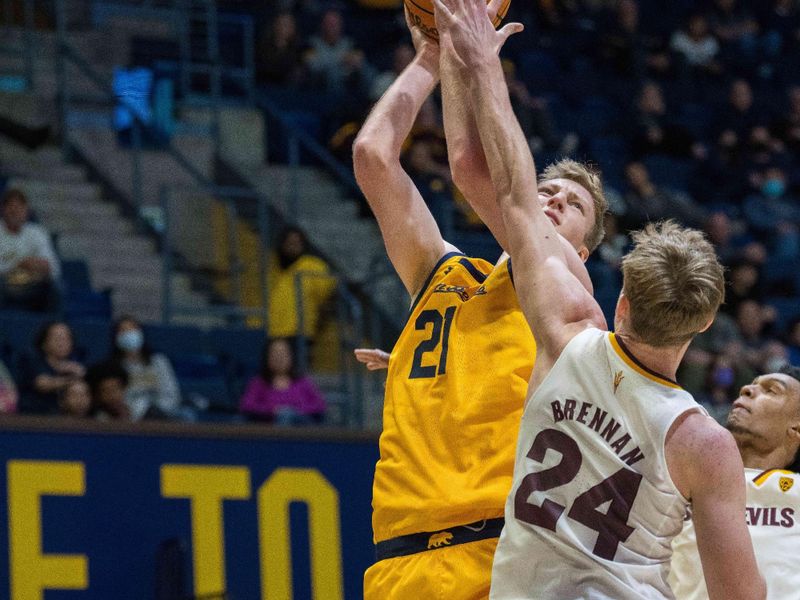 Feb 11, 2023; Berkeley, California, USA; California Golden Bears forward Lars Thiemann (21) shoots the jump shot against Arizona State Sun Devils forward Duke Brennan (24) during the second half at Haas Pavilion. Mandatory Credit: Neville E. Guard-USA TODAY Sports