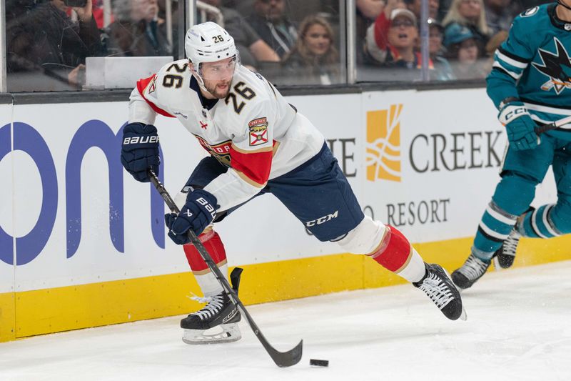 Nov 14, 2023; San Jose, California, USA; Florida Panthers defenseman Uvis Balinskis (26) controls the puck during the second period against the San Jose Sharks at SAP Center at San Jose. Mandatory Credit: Stan Szeto-USA TODAY Sports