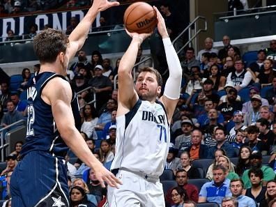 ORLANDO, FL - NOVEMBER 6: Luka Doncic #77 of the Dallas Mavericks shoots the ball during the game against the Orlando Magic on November 6, 2023 at Amway Center in Orlando, Florida. NOTE TO USER: User expressly acknowledges and agrees that, by downloading and or using this photograph, User is consenting to the terms and conditions of the Getty Images License Agreement. Mandatory Copyright Notice: Copyright 2023 NBAE (Photo by Gary Bassing/NBAE via Getty Images)