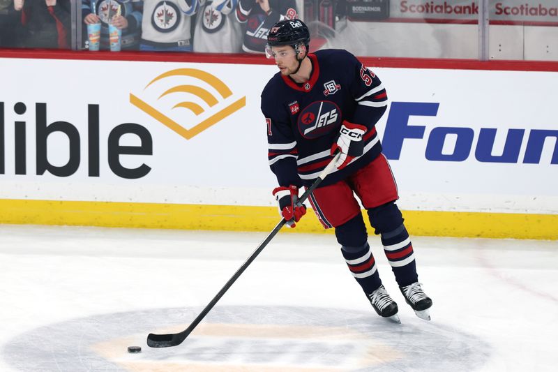 Mar 15, 2026; Winnipeg, Manitoba, CAN;  Winnipeg Jets defenseman Elias Salomonsson (57) warms up before a game against the St. Louis Blues at Canada Life Centre. Mandatory Credit: James Carey Lauder-Imagn Images
