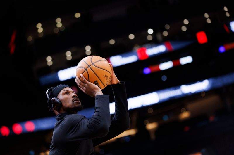 TORONTO, CANADA - JANUARY 17: Jimmy Butler #22 of the Miami Heat warms up ahead of the game against the Toronto Raptors at Scotiabank Arena on January 17, 2024 in Toronto, Canada. NOTE TO USER: User expressly acknowledges and agrees that, by downloading and or using this photograph, User is consenting to the terms and conditions of the Getty Images License Agreement. (Photo by Cole Burston/Getty Images)