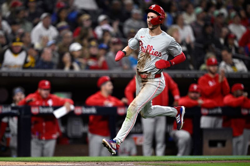 Apr 26, 2024; San Diego, California, USA; Philadelphia Phillies shortstop Trea Turner (7) advances home to score a run during the fourth inning against the San Diego Padres at Petco Park. Mandatory Credit: Orlando Ramirez-USA TODAY Sports