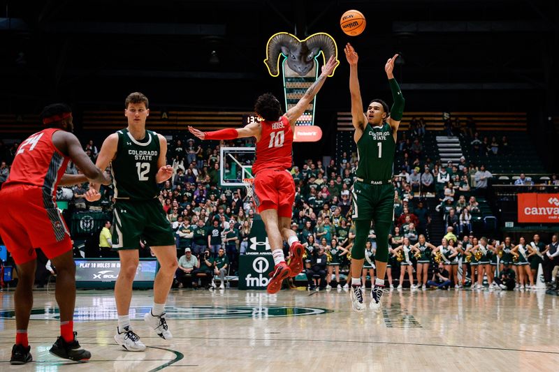 Mar 3, 2023; Fort Collins, Colorado, USA; Colorado State Rams guard John Tonje (1) attempts a shot against New Mexico Lobos guard Jaelen House (10) as forward Morris Udeze (24) and forward Patrick Cartier (12) defend in the second half at Moby Arena. Mandatory Credit: Isaiah J. Downing-USA TODAY Sports