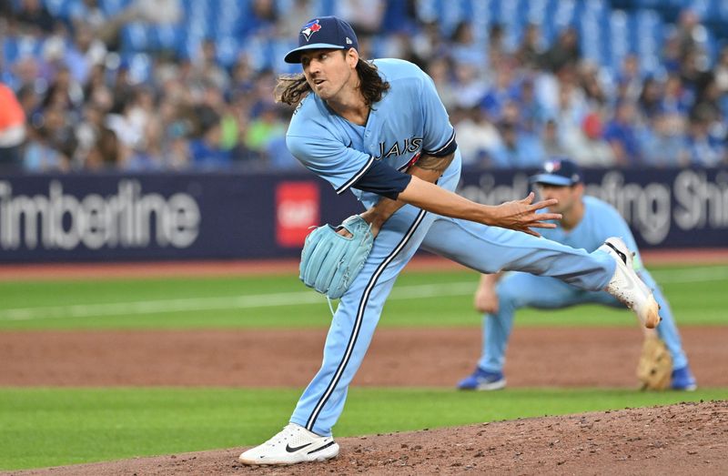 Aug 28, 2023; Toronto, Ontario, CAN;  Toronto Blue Jays starting pitcher Kevin Gausman (34) delivers a pitch against the Washington National in the second inning at Rogers Centre. Mandatory Credit: Dan Hamilton-USA TODAY Sports