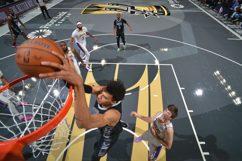 SAN ANTONIO, TX - NOVEMBER 15: Victor Wembanyama #1 of the San Antonio Spurs dunks the ball during the game against the Los Angeles Lakers during the Emirates NBA Cup game on November 15, 2024 at the Frost Bank Center in San Antonio, Texas. NOTE TO USER: User expressly acknowledges and agrees that, by downloading and or using this photograph, user is consenting to the terms and conditions of the Getty Images License Agreement. Mandatory Copyright Notice: Copyright 2024 NBAE (Photos by Jesse D. Garrabrant/NBAE via Getty Images)