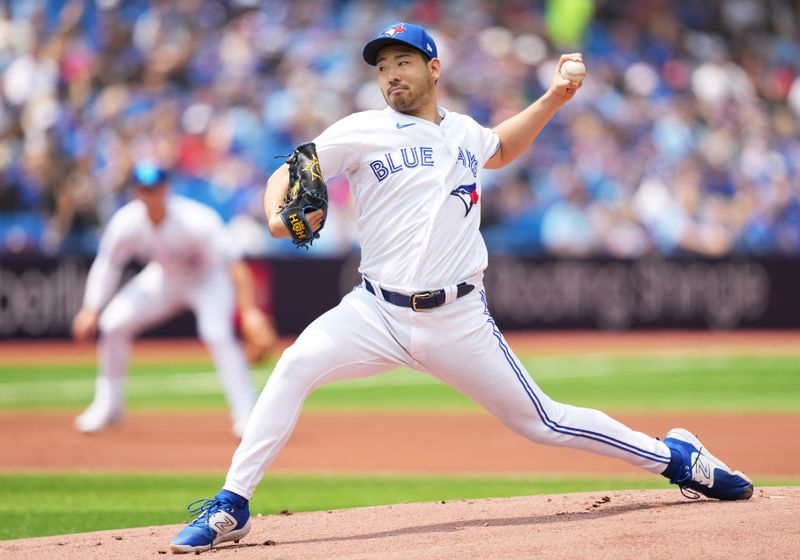 Jul 16, 2023; Toronto, Ontario, CAN; Toronto Blue Jays starting pitcher Yusei Kikuchi (16) throws pitch against the Arizona Diamondbacks during the first inning at Rogers Centre. Mandatory Credit: Nick Turchiaro-USA TODAY Sports