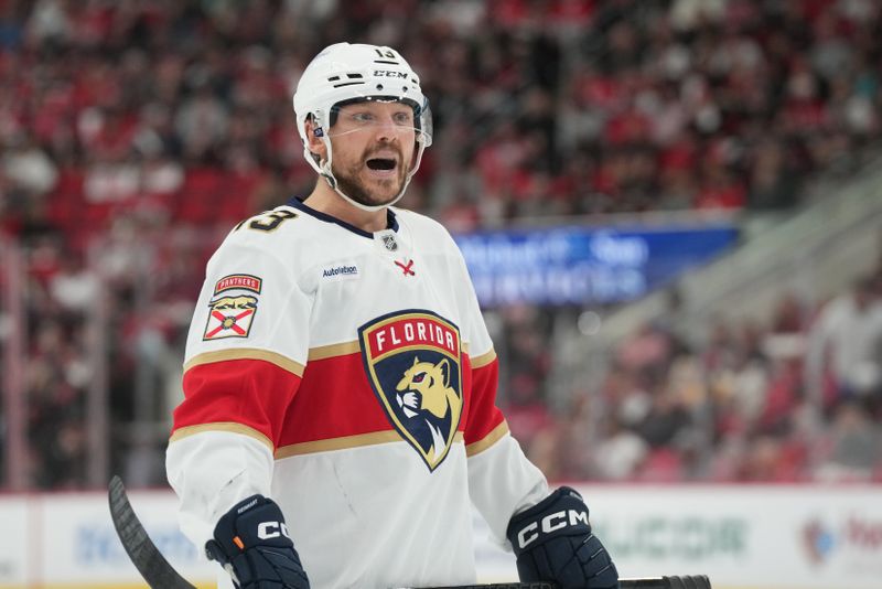 May 20, 2025; Raleigh, North Carolina, USA;  Florida Panthers forward Sam Reinhart (13) reacts during the second period against the Carolina Hurricanes in game one of the Eastern Conference Final of the 2025 Stanley Cup Playoffs at Lenovo Center. Mandatory Credit: James Guillory-Imagn Images