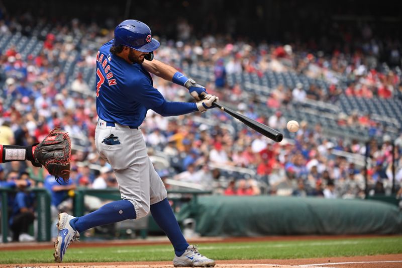 Sep 1, 2024; Washington, District of Columbia, USA; Chicago Cubs shortstop Dansby Swanson (7) hits the ball into play against the Washington Nationals during the first inning at Nationals Park. Mandatory Credit: Rafael Suanes-USA TODAY Sports