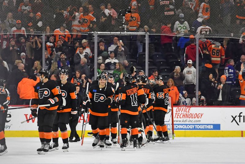 Mar 19, 2024; Philadelphia, Pennsylvania, USA; Philadelphia Flyers celebrate win Toronto Maple Leafs at Wells Fargo Center. Mandatory Credit: Eric Hartline-USA TODAY Sports