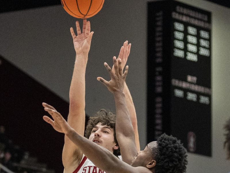 Mar 7, 2024; Stanford, California, USA; Stanford Cardinal guard Benny Gealer (15) shoot the basketball against California Golden Bears guard Jalen Cone (15) during the second half at Maples Pavillion. Mandatory Credit: Neville E. Guard-USA TODAY Sports