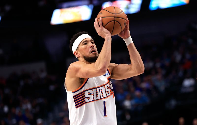 DALLAS, TX - FEBRUARY 22: Devin Booker #1 of the Phoenix Suns goes up for a shot against the Dallas Mavericks in the first half at American Airlines Center on February 22, 2024 in Dallas, Texas. NOTE TO USER: User expressly acknowledges and agrees that, by downloading and or using this photograph, User is consenting to the terms and conditions of the Getty Images License Agreement. (Photo by Ron Jenkins/Getty Images)