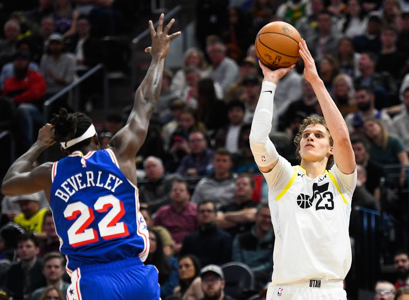 SALT LAKE CITY, UTAH - FEBRUARY 01: Lauri Markkanen #23 of the Utah Jazz shoots over Patrick Beverley #22 of the Philadelphia 76ers during the first half at Delta Center on February 01, 2024 in Salt Lake City, Utah. NOTE TO USER: User expressly acknowledges and agrees that, by downloading and or using this photograph, User is consenting to the terms and conditions of the Getty Images License Agreement. (Photo by Alex Goodlett/Getty Images)