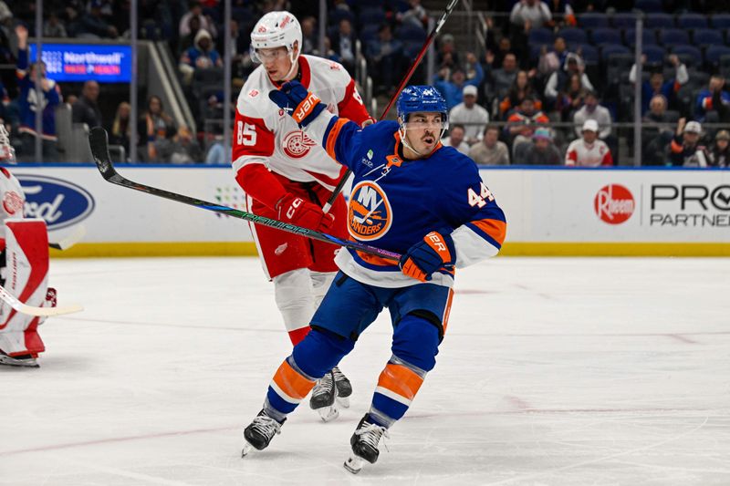 Oct 23, 2025; Elmont, New York, USA;  New York Islanders center Jean-Gabriel Pageau (44) celebrates his goal against the Detroit Red Wings during the second period at UBS Arena. Mandatory Credit: Dennis Schneidler-Imagn Images