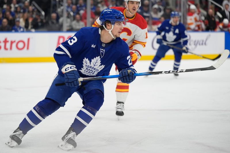Oct 28, 2025; Toronto, Ontario, CAN; Toronto Maple Leafs forward Matthew Knies (23) skates against the Calgary Flames during the first period at Scotiabank Arena. Mandatory Credit: John E. Sokolowski-Imagn Images