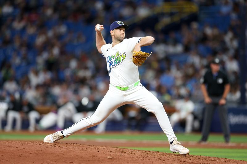 Jul 12, 2024; St. Petersburg, Florida, USA; Tampa Bay Rays pitcher Jason Adam (47) throws a pitch against the Cleveland Guardians in the ninth inning at Tropicana Field. Mandatory Credit: Nathan Ray Seebeck-USA TODAY Sports