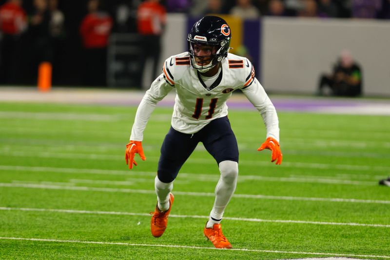 Chicago Bears wide receiver Darnell Mooney (11) runs up field during the first half of an NFL football game against the Minnesota Vikings, Monday, Nov. 27, 2023, in Minneapolis. (AP Photo/Bruce Kluckhohn)