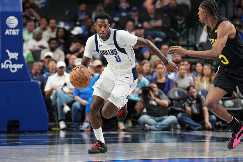 DALLAS, TX - OCTOBER 10: Olivier Maxence-Prosper #8 of the Dallas Mavericks drives to the basket during the game against the Utah Jazz on October 10, 2024 at American Airlines Center in Dallas, Texas. NOTE TO USER: User expressly acknowledges and agrees that, by downloading and or using this photograph, User is consenting to the terms and conditions of the Getty Images License Agreement. Mandatory Copyright Notice: Copyright 2024 NBAE (Photo by Glenn James/NBAE via Getty Images)