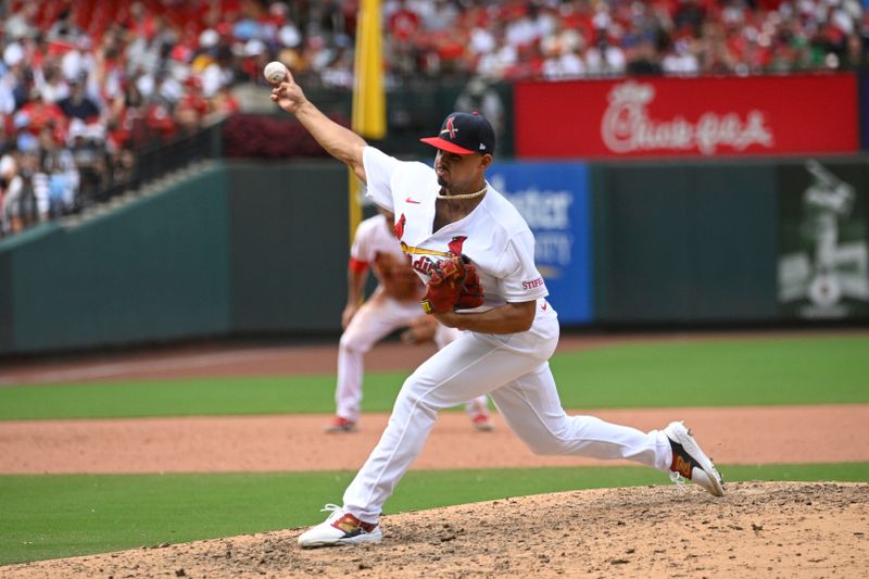 Jul 2, 2023; St. Louis, Missouri, USA; St. Louis Cardinals relief pitcher Jordan Hicks (12) pitches against the New York Yankees in the ninth inning at Busch Stadium. Mandatory Credit: Joe Puetz-USA TODAY Sports