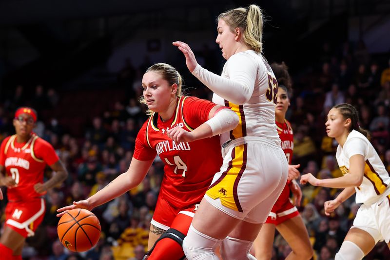 Jan 3, 2024; Minneapolis, Minnesota, USA; Maryland Terrapins forward Allie Kubek (14) works around Minnesota Golden Gophers center Sophie Hart (52) during the second half at Williams Arena. Mandatory Credit: Matt Krohn-USA TODAY Sports