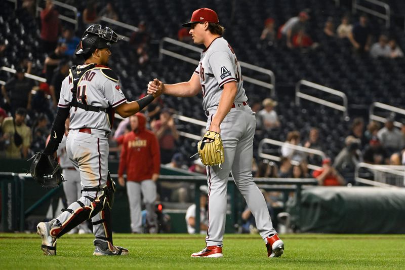 Jun 6, 2023; Washington, District of Columbia, USA; Arizona Diamondbacks relief pitcher Kevin Ginkel (37) is congratulated by catcher Gabriel Moreno (14) after the final out against the Washington Nationals at Nationals Park. Mandatory Credit: Brad Mills-USA TODAY Sports