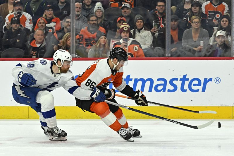 Jan 23, 2024; Philadelphia, Pennsylvania, USA; Tampa Bay Lightning defenseman Nick Perbix (48) checks the puck away form Philadelphia Flyers left wing Joel Farabee (86) during the third period at Wells Fargo Center. Mandatory Credit: Eric Hartline-USA TODAY Sports